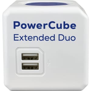 A white power cube with two USB ports, featuring a blue top and a logo.