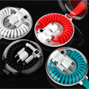 A collection of charging cables in red, white, and turquoise, coiled in clear cases with a logo on the surface.