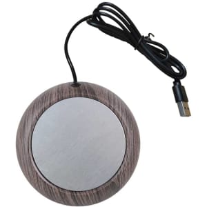 A round USB cup warmer with a wooden texture and metallic centre, featuring a black cable.