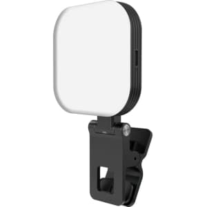 A magnetic LED selfie light in black with a square white panel and adjustable clip for attachment.
