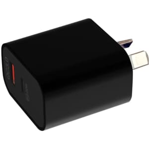 A black wall charger features a USB port and prongs for connecting to power outlets. It has branding on the side.