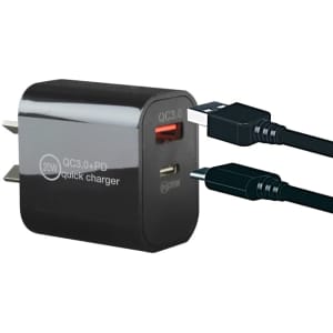A black wall charger featuring dual USB ports, including Quick Charge 3.0 technology. It has a sleek design and branding.