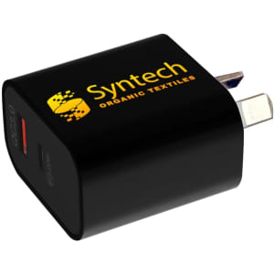 A black wall charger with a USB port, featuring a logo on one side and a prong for plugging in.