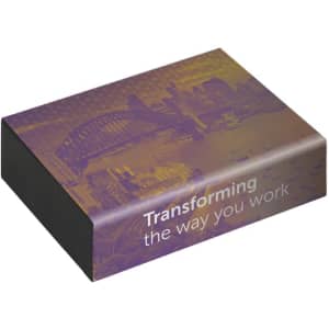 A rectangular box with a purple design featuring a city skyline, including a prominent bridge. It has a logo.