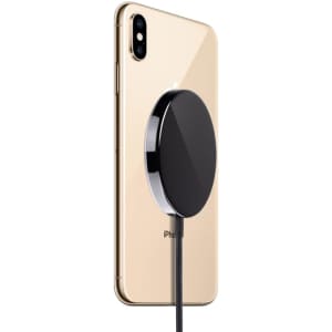 A black MagSafe iPhone case attached to a gold iPhone, showcasing its sleek design.