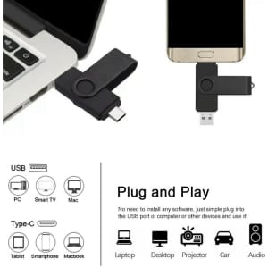 A black Type-C flash drive connected to a smartphone and laptop, showcasing its dual USB functionality and design.