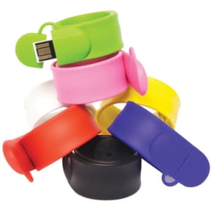 A set of colourful USB flash drives in the shape of wearable slap bands, featuring green, pink, yellow, red, black, and white.