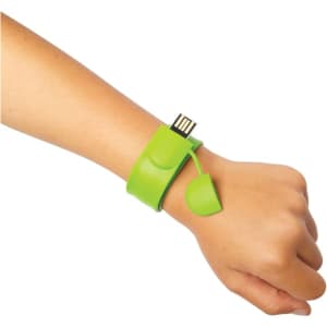 A green USB flash drive designed as a slap bracelet, worn on a wrist with a removable cap.