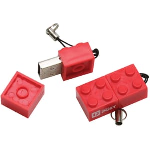 A red building block flash drive with two detachable pieces, featuring a logo and a loop for attachment.