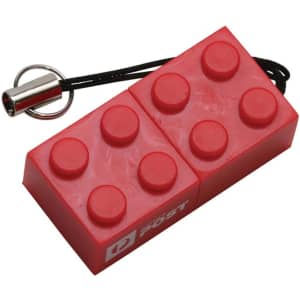 A red building block-shaped flash drive with a keyring attachment and a branding logo.