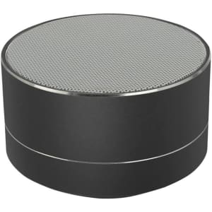 A round black Bluetooth speaker featuring a silver trim and a textured speaker grille on top.