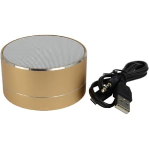 A gold Bluetooth speaker with a silver mesh top and included USB and auxiliary cables.