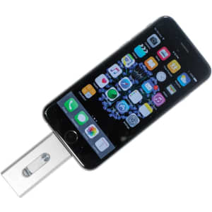 A silver OTG USB 3.0 flash drive is connected to a black smartphone displaying various app icons.