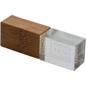 An eco-friendly flash drive featuring a clear crystal body and a wooden bamboo cap.