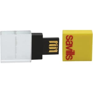 A moulded 3D crystal flash drive with a yellow cap and a transparent base, featuring a logo.