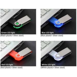 A flash drive with multiple LED light options: green, blue, red, and white. It features a silver metal casing.
