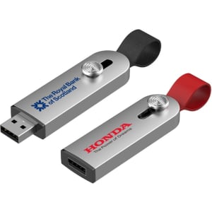 A silver flash drive with a black and red strap, featuring branding on both sides.