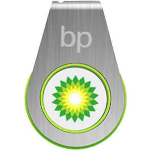 A silver and green flash drive with a circular design and a logo featuring a yellow and green pattern.