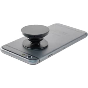 A black phone stand positioned on the back of a grey smartphone, featuring a circular design.
