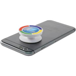 A white pocket socket phone stand is attached to a grey smartphone, featuring a multicoloured design on top.