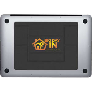A sleek silver laptop stand with a black base and a logo in the centre.