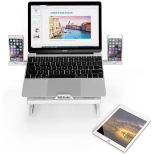 A foldable laptop stand in silver, supporting a laptop and two smartphones, with a tablet positioned underneath.