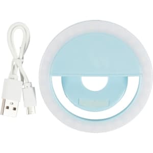 A circular blue LED selfie light with a USB charging cable. It features a smiling face design.