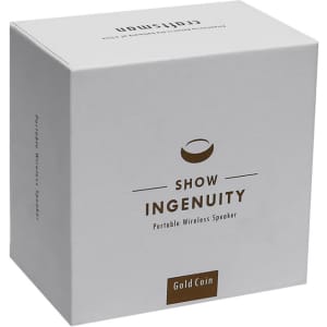 A white box featuring a logo and text, containing a portable wireless speaker in a gold colour.