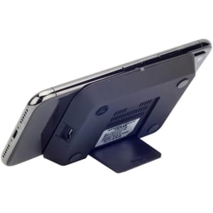 A black wireless charger stand with a mobile phone positioned upright on it, featuring a branding logo.