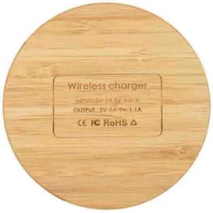 A round bamboo wireless charger with a smooth surface and a hidden logo on the bottom.