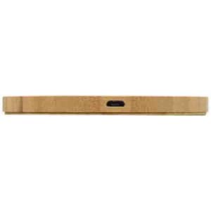 A bamboo wireless charger in a minimalist design, featuring a USB-C port for connectivity.