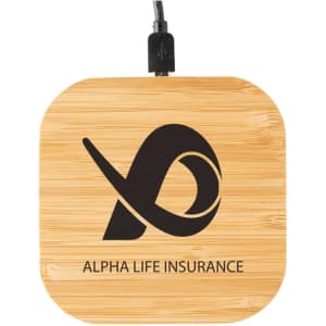 A bamboo wireless charger in a square shape, featuring a logo and a black finish.