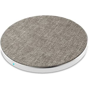 A round wireless charger featuring a grey tweed fabric surface and a sleek white base. It includes a small logo.