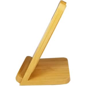 A wireless charger made of bamboo, featuring a sleek, angled design with a square base.