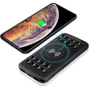 A black wireless power bank with an 8000 mAh capacity and a smartphone charging on top, featuring a logo.