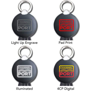 A set of keychains featuring different designs, including light-up engravings and coloured prints, with a round shape and metal ring.