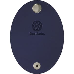 A navy oval cable wrap with a metal attachment hole and a logo. Features a smooth surface.