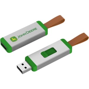 A green and silver flash drive with a brown strap and a logo on the side.