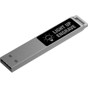 A silver LED flash drive featuring a black surface with an engraved logo.