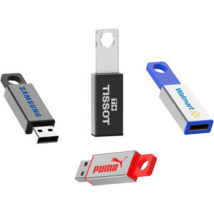 Four flash drives in varying designs: one silver, one grey, one blue, and one red, each featuring a logo.