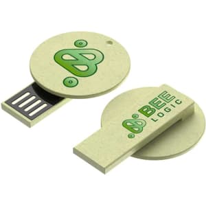 A green and cream circular flash drive featuring a logo and a sliding connector. The design is eco-friendly.