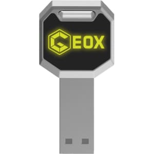 A silver and black LED flash drive with a hexagonal shape and a logo.