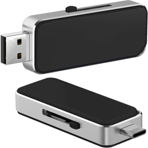 A sleek black and silver Oak Type-C LED flash drive with a retractable connector and a branding logo.