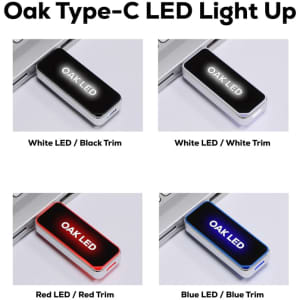 Four Oak Type-C LED flash drives in black, white, red, and blue trims, featuring illuminated logos on each.