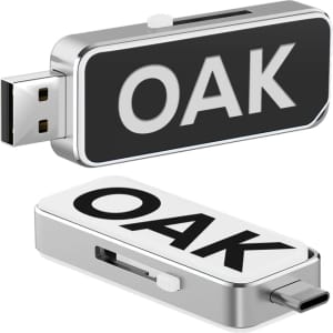 A silver and black USB flash drive with a Type-C connector and a logo.