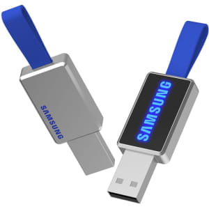 A silver USB flash drive with a blue strap and a branding logo on one side.