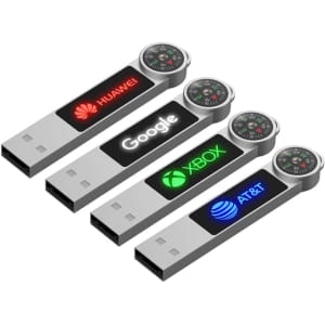 A set of four silver LED flash drives featuring logos and a compass design on the end.