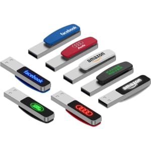 A collection of LED flash drives in various colours, including red, white, blue, and black, featuring multiple logos.