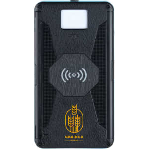 A black solar wireless power bank with a textured surface and an emblem. It features a wireless charging symbol.