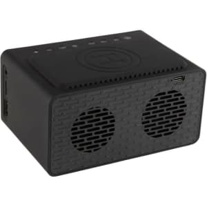 A black wireless charger speaker with two audio grills and a textured surface, featuring control buttons on top.